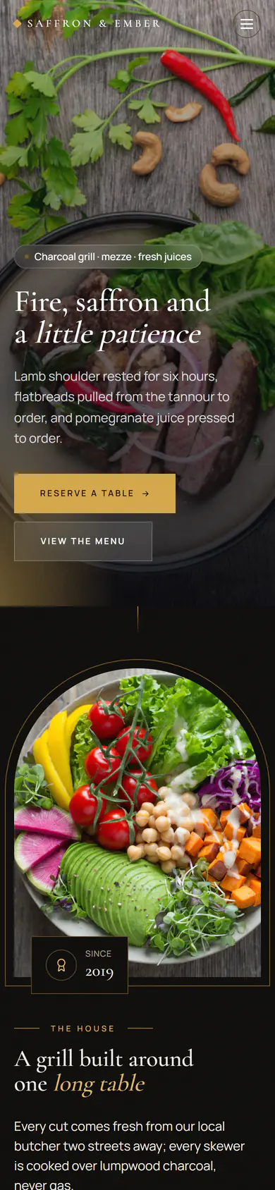 Website for Saffron & Ember, a charcoal grill and mezze house: full-bleed dark photo of grilled dishes with gold serif type, an arched image story and an à la carte menu. Shown on a phone.